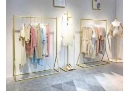 Золоті стійки вішалки для магазину