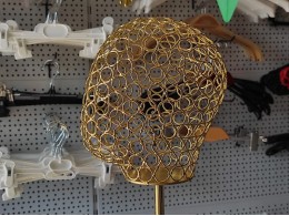 Голова жіноча на підставці, стилізована (світл.золото)